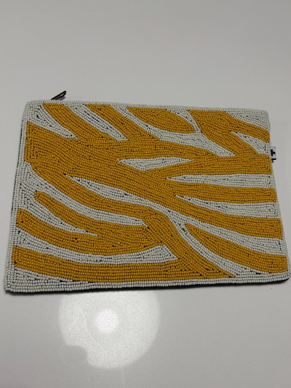 Ink and Alloy beaded clutch in excellent condition.